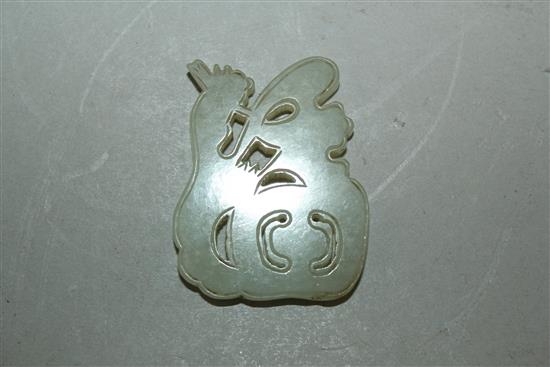 A Chinese pale celadon jade carving of the character Fu, early 20th century, 4.7cm